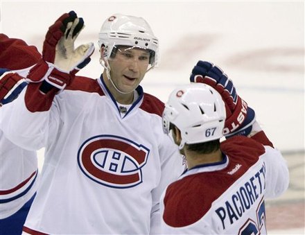 VIDEO: Erik Cole Scores and Gives Referee High-Five