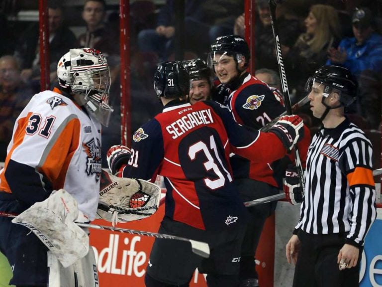 Windsor Spitfires Logan Brown, centre